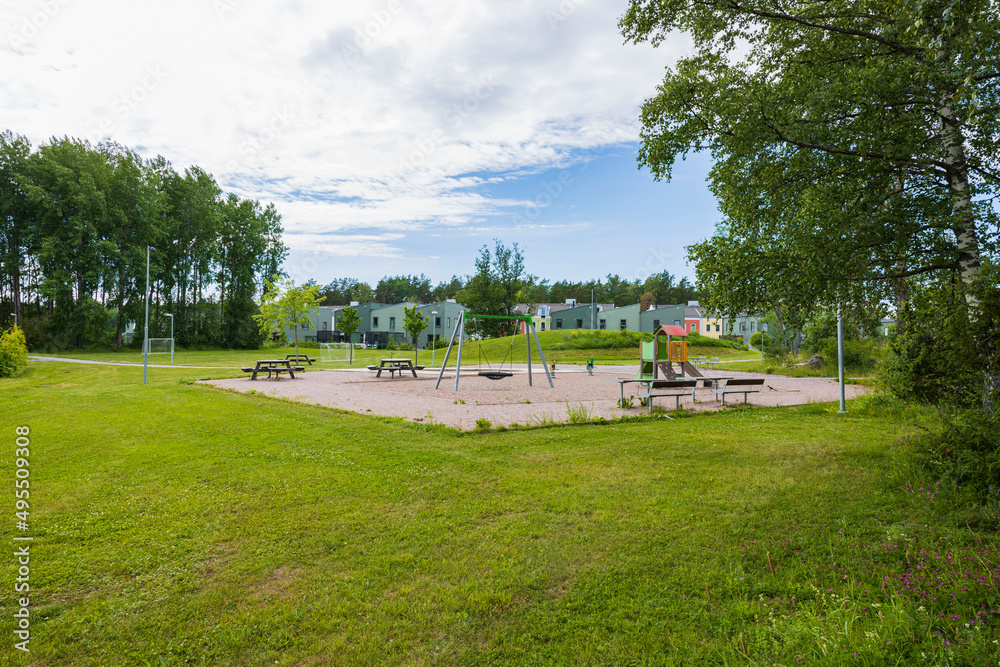 Beautiful view of playground in cottage village. Sweden.