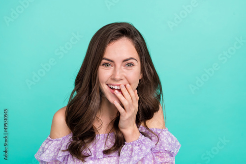 Portrait of attractive cheerful girl laughing good mood rest funny day 1 april isolated over bright blue color background