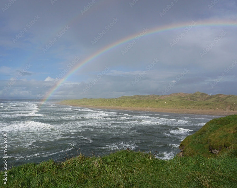 rainbow over the sea rainbow over the sea