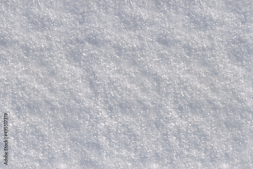 White clean snow background texture. Texture of white snow. Snow surface.