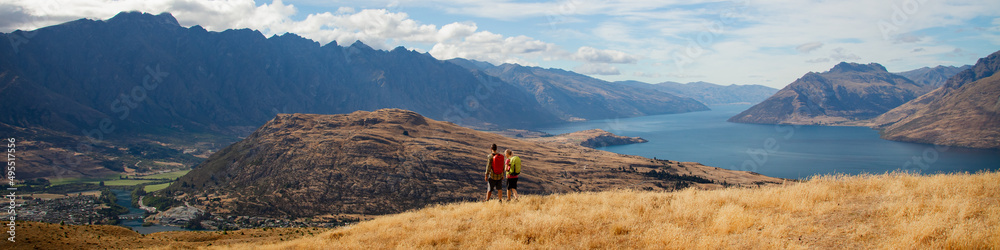 Panorama of The Remarkables Otago young adventure couple vacation trekking