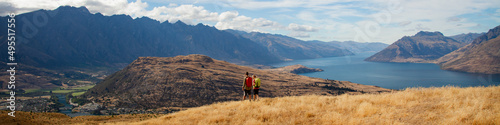 Panorama of The Remarkables Otago young adventure couple vacation trekking