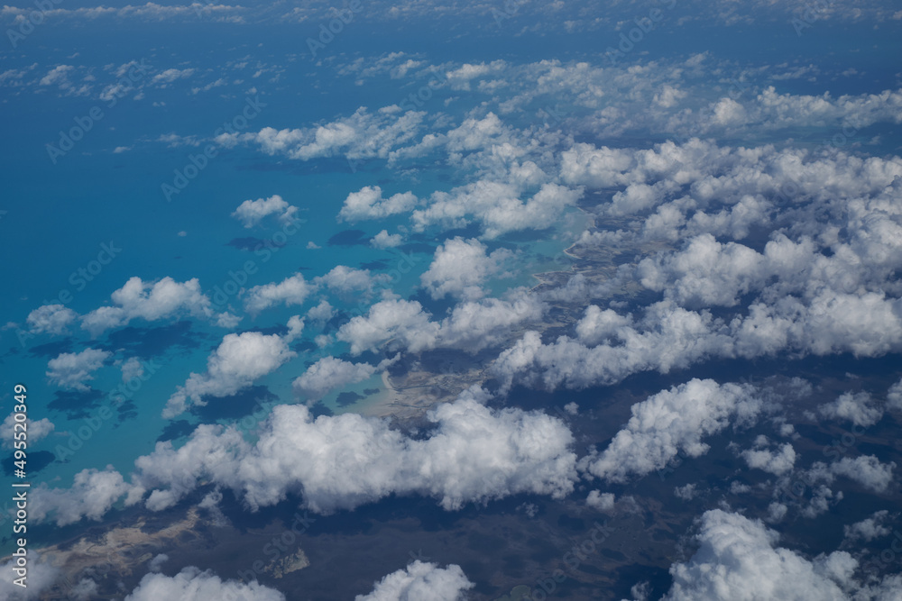 flying high above the clouds