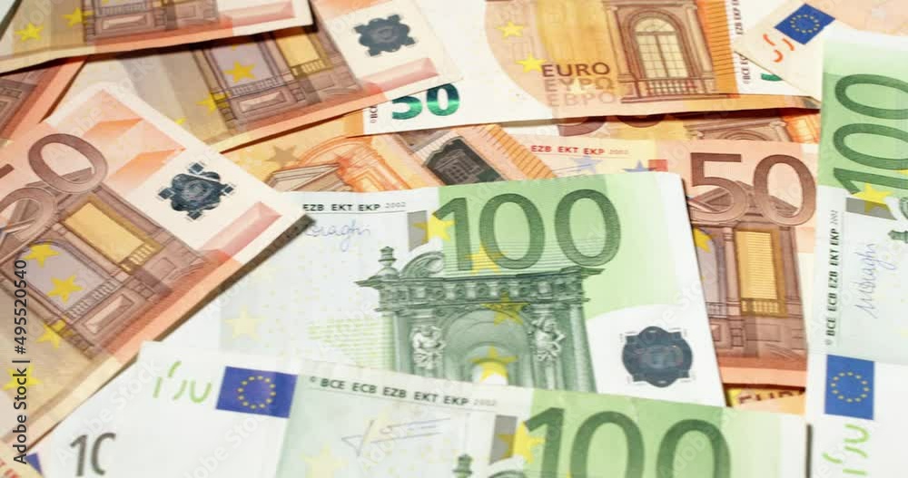 100 and fifty Euro banknotes from European monetary union. EUR currency, one hundred and fifty Euros 100 and fifty Euro banknotes from European monetary union. EUR currency, one hundred and fifty Euros