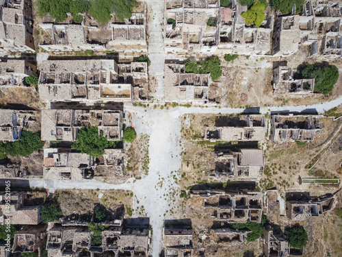 Aerial drone view of Ruins of Poggioreale in the Belice valley, province of Trapani, destroyed by 1968 earthquake. Abandoned eerie ghost town, Sicily.