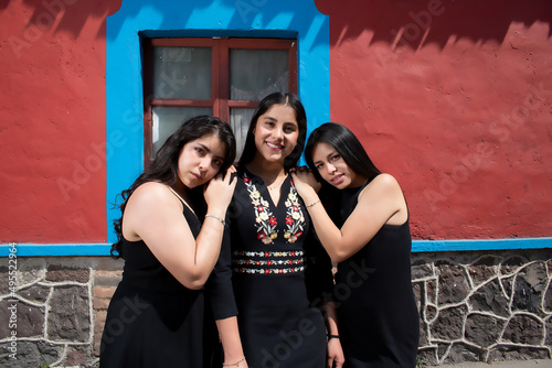 Sensual young latin woman posing in mexican town