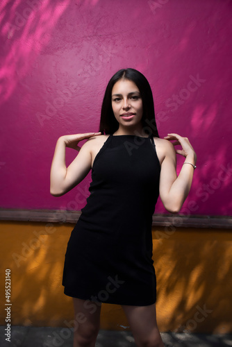 Sensual young latin woman posing in mexican town