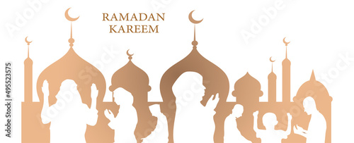 Silhouette of muslim men and woman praying, ramadan kareem