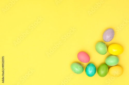 Easter eggs decoration yellow paper background