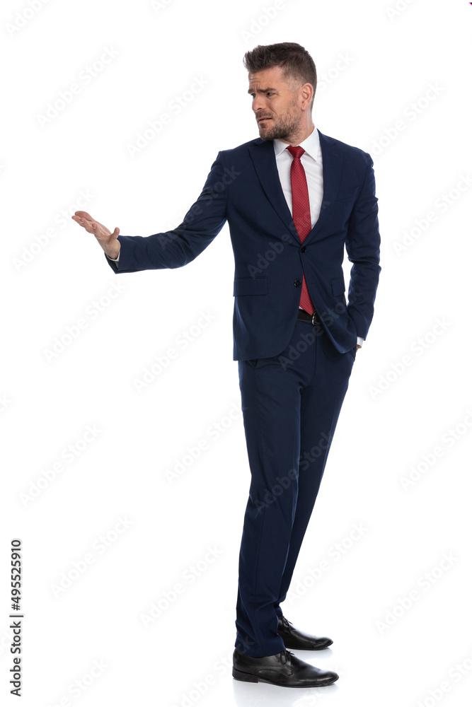 businessman turning around and asking for explanations businessman turning around and asking for explanations