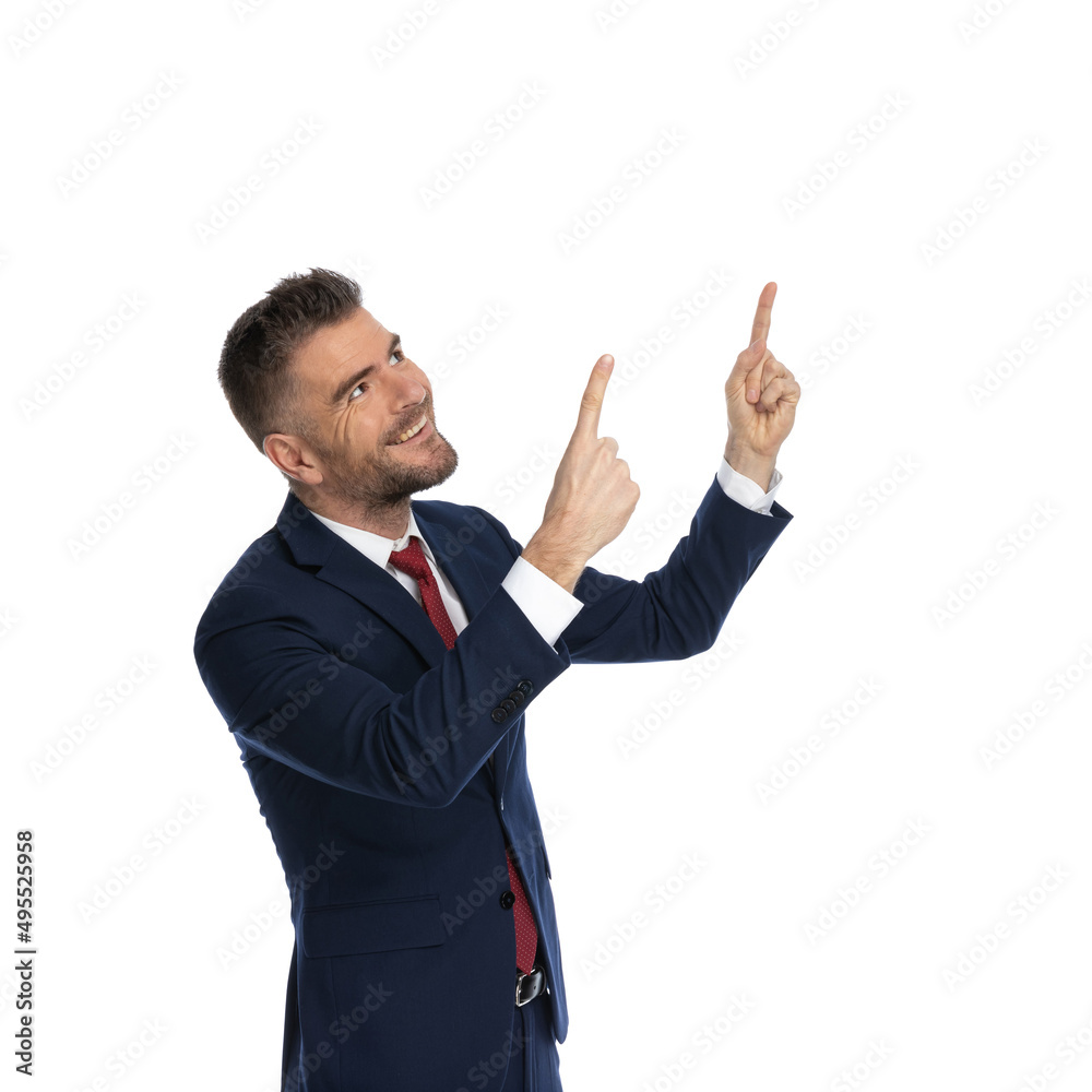 businessman pointing up to God with grattitude businessman pointing up to God with grattitude