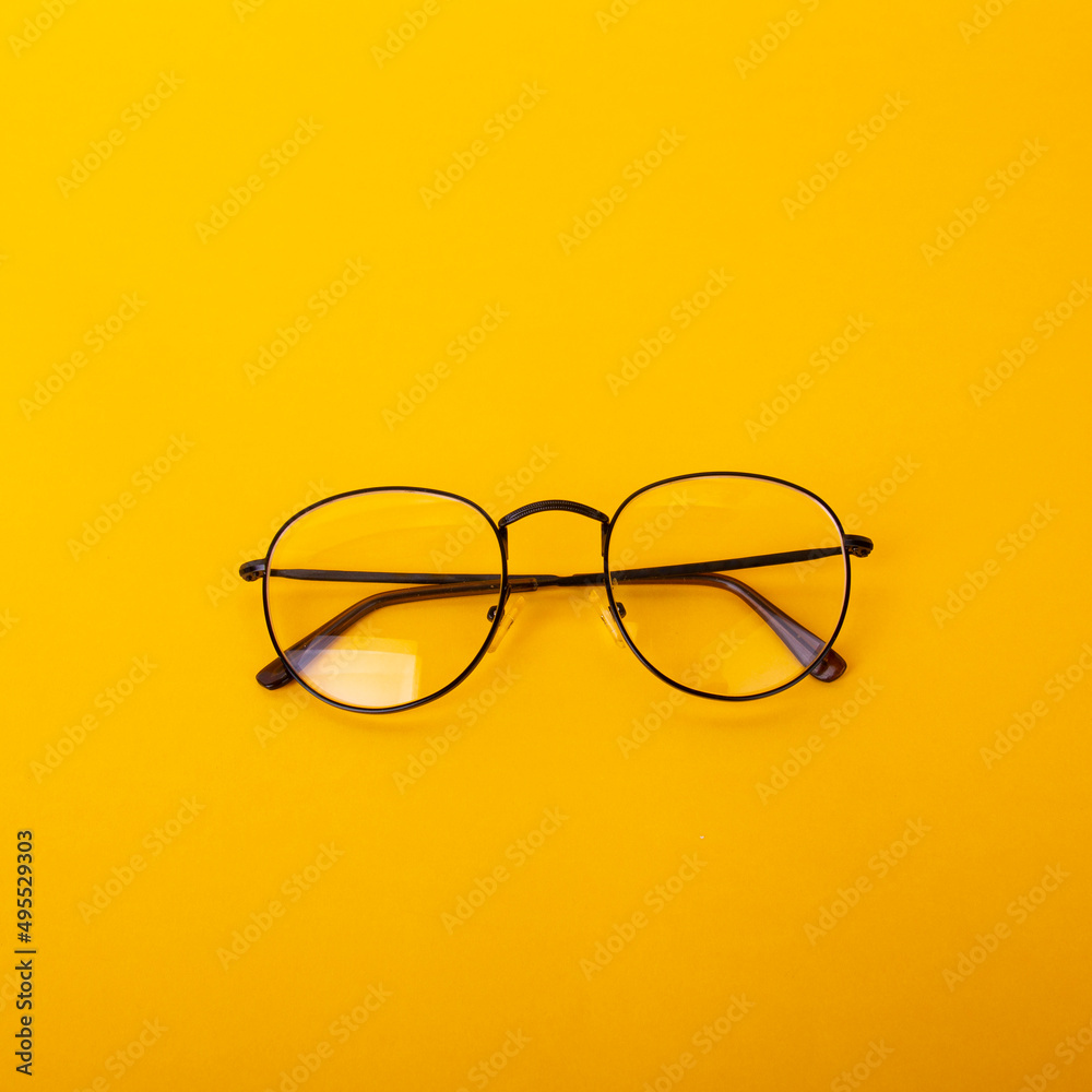 Eye glasses isolated on yellow background. Eye glasses isolated on yellow background.