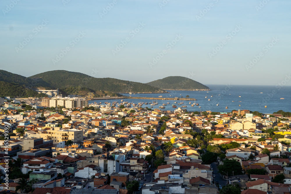 Arraial do Cabo, Rio de Janeiro, Brazil - red sunrise of wonderful paradise beach with white sands and turquoise water Arraial do Cabo, Rio de Janeiro, Brazil - red sunrise of wonderful paradise beach with white sands and turquoise water