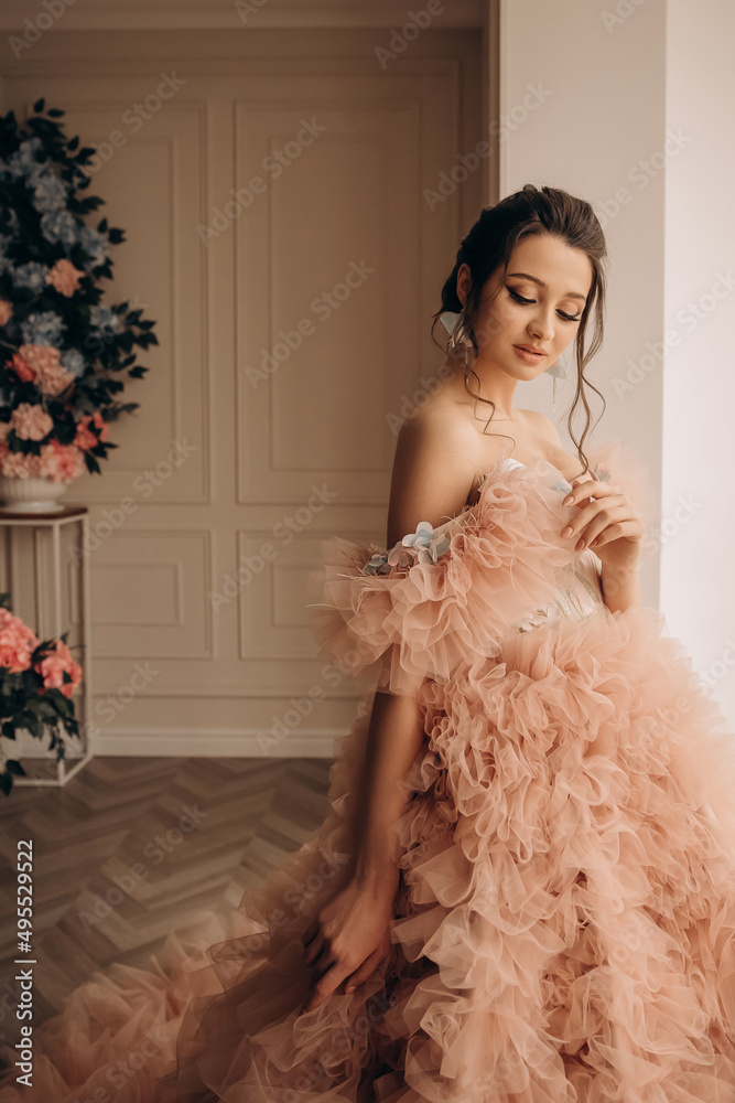 Cute girl in pink dress store