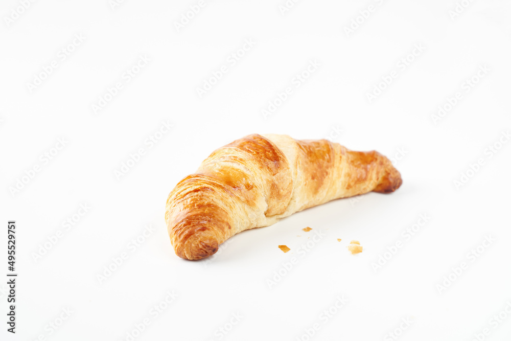 Flat lay home backed fresh French croissant isolated on white background Flat lay home backed fresh French croissant isolated on white background