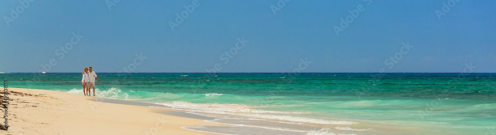 Panoramic view of Caucasian couple on paradise island Panoramic view of Caucasian couple on paradise island