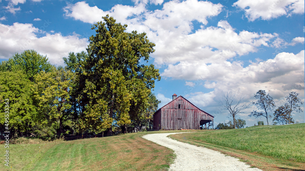 Rural countryside farm landscape with aging barn Rural countryside farm landscape with aging barn