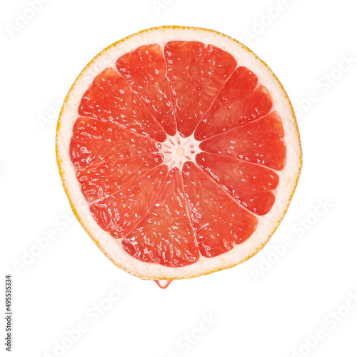 Red grapefruit essential oil dripping. Fresh citrus slice dripping with juice or oil serum ingredient. Seed oil extract.	
