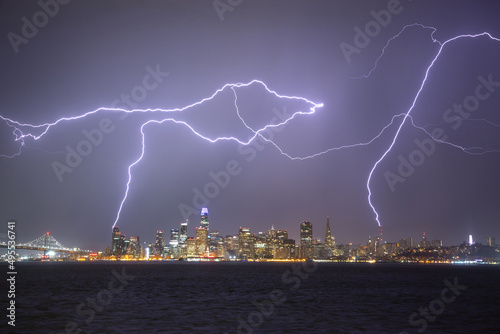 A dramatic lightning storm over San Francisco, California, viewed from Treasure Island photo