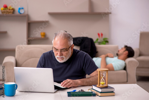 Old grandfather in distant learning concept during pandemic