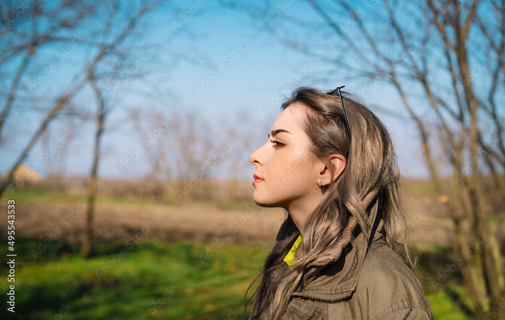 Portrait of young woman in spring forest Portrait of young woman in spring forest