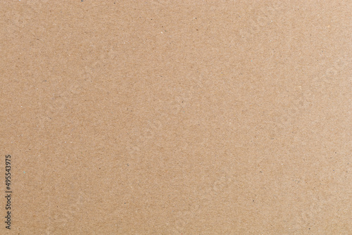 High-quality light brown cardboard - as a material for creativity or packaging. Recycled paper, environmentally friendly raw materials. Fiber texture or background © hodim