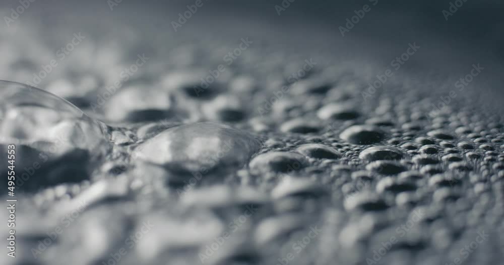Boiling water surface bubbles and haze in macro extreme close up