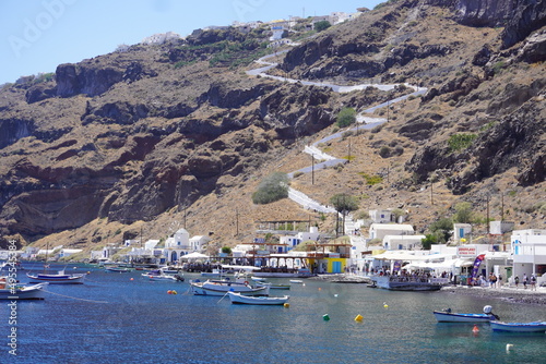 Boats in the harbor of a Greek island photo