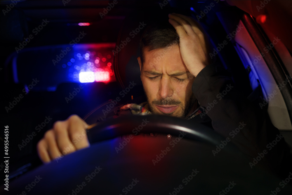 Road police car with flashing lights stopped man driver because of