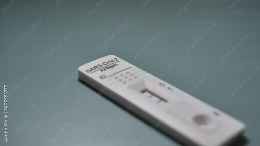 Covid rapid antigen test positive result. Infection, screening and treatment. Slowmotion. Scene B. Covid rapid antigen test positive result. Infection, screening and treatment. Slowmotion. Scene B.