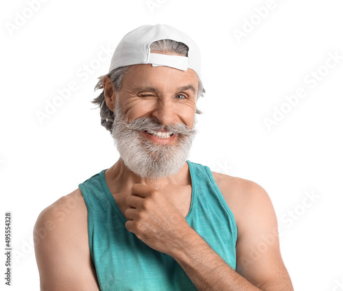 Cool mature man on white ba...
