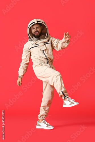Dancing beekeeper on red ba...