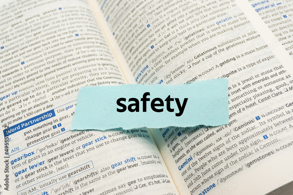 Obraz premium safety.The word is written on a slip of paper. Emotional nouns, feeling words, emotional phrases. Positive or negative attitudes.