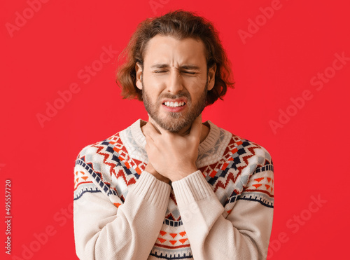 Ill man with sore throat on...