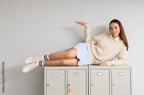 Female student lying on loc...