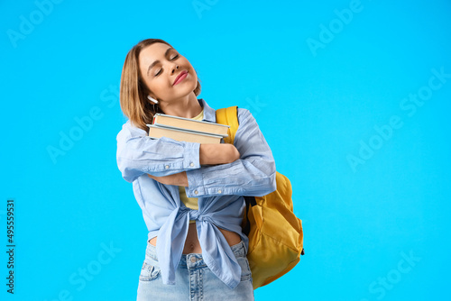 Female student with books o...