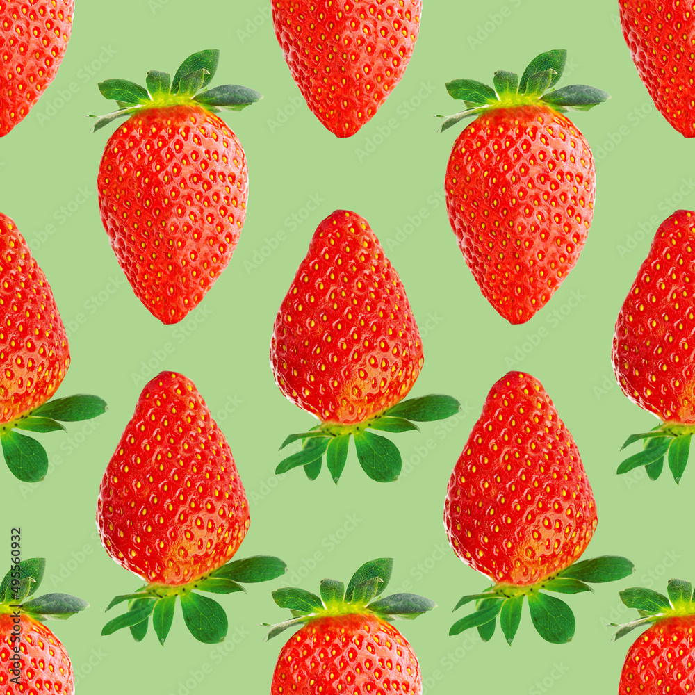 Fresh strawberry seamless pattern. Ripe strawberries isolated on green. Package design background. Falling strawberry selective focus. Fresh strawberry seamless pattern. Ripe strawberries isolated on green. Package design background. Falling strawberry selective focus.