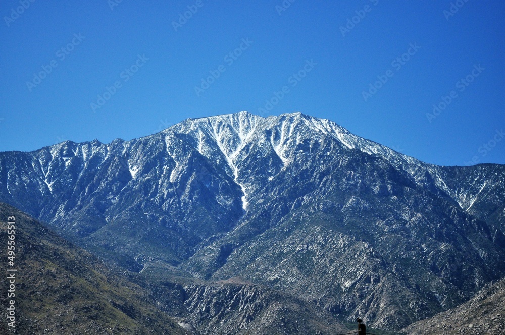 mountain peak with snow in summer