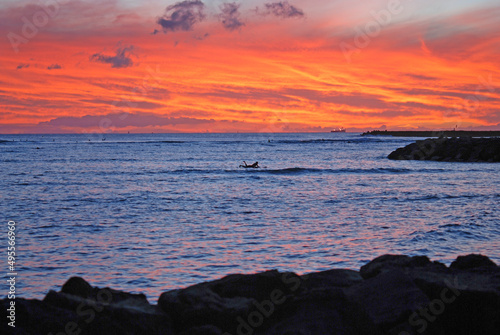 Sunset over Waikiki beach in Honolulu  Hawaii