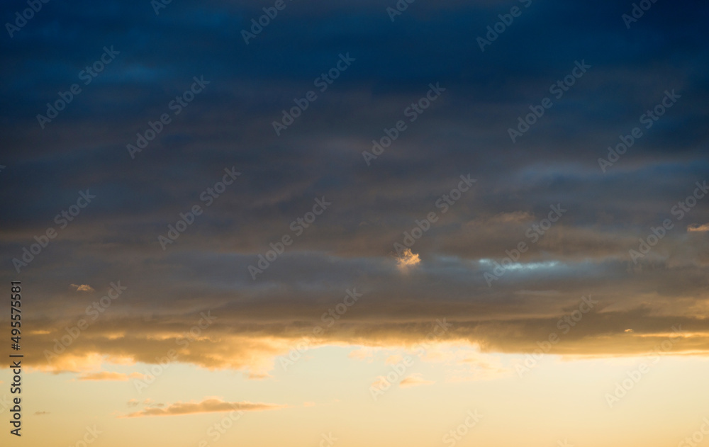 Beautiful sunset sky with clouds