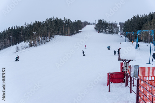 photo of people at the ski resort, ski lift