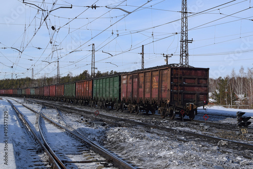 Freight wagons with coal at the railway station. Loading wagons for export.