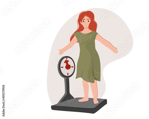 A woman stands on the scales, finds out her weight