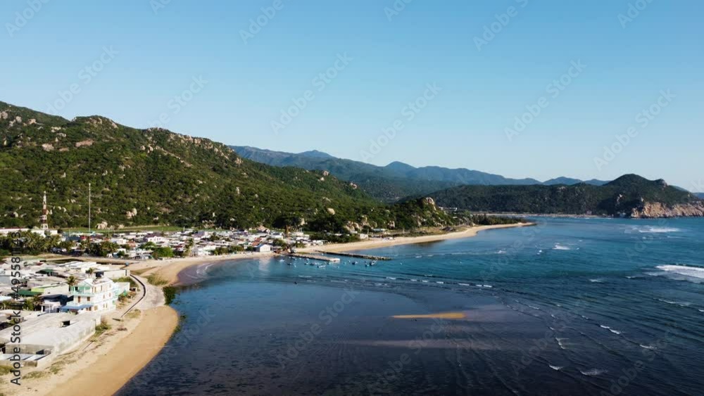 Aerial view on small fishing harbour in coastal town Thai An, Vietnam Aerial view on small fishing harbour in coastal town Thai An, Vietnam