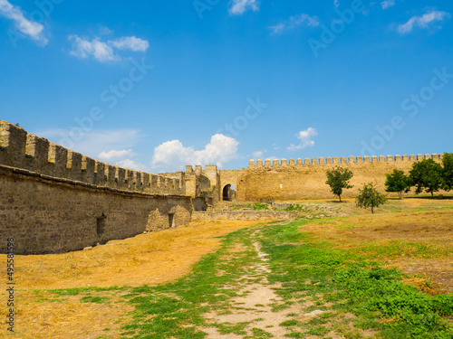 Belgorod Dniester fortress. The ruins of medieval Akkerman Fortress, Bilhorod Dnistrovskyi, Ukraine. Ruins of the citadel. Exteriors of the stronghold on a sunny summer day. photo