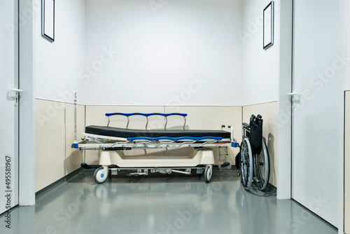 Empty hospital hallway with surgical transport equipment photo
