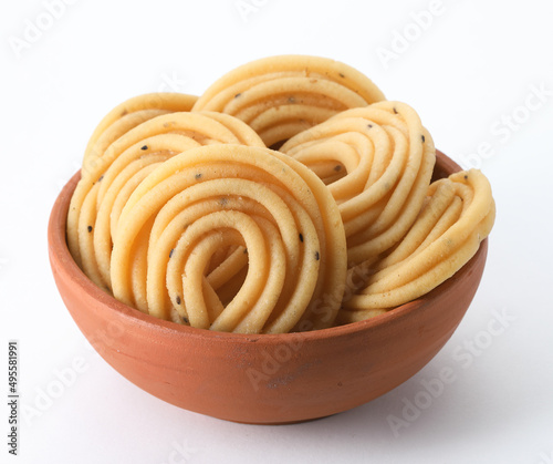 Murukku also known as chakli south indian traditional vegetarian snack photo