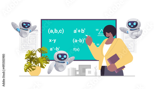 teacher with robots solving math problem on digital chalkboard during lesson education artificial intelligence