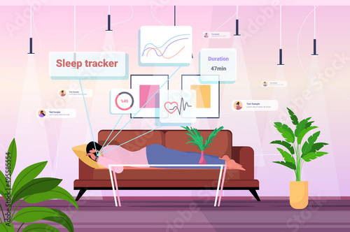tired woman sleeping with electronic smart watch app tracker on hand quality and quantity sleep control concept