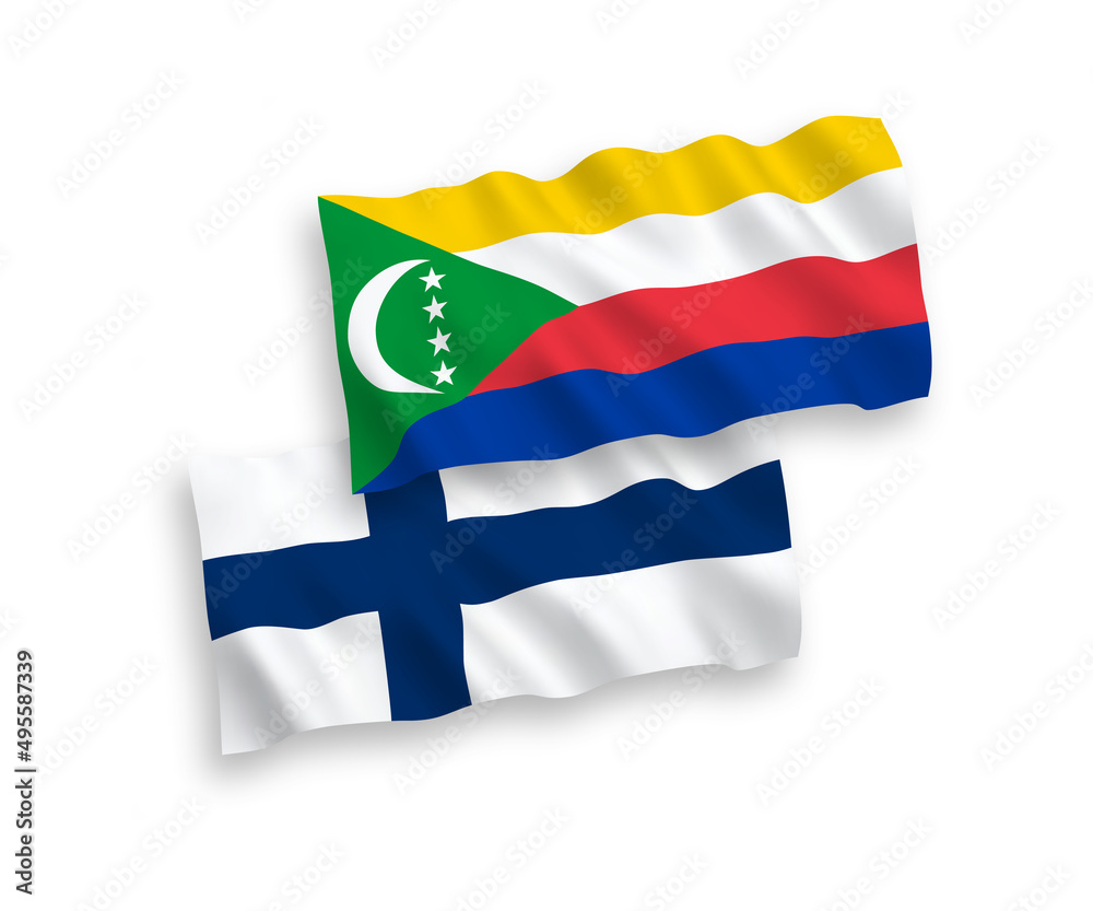 National vector fabric wave flags of Finland and Union of the Comoros isolated on white background. 1 to 2 proportion.